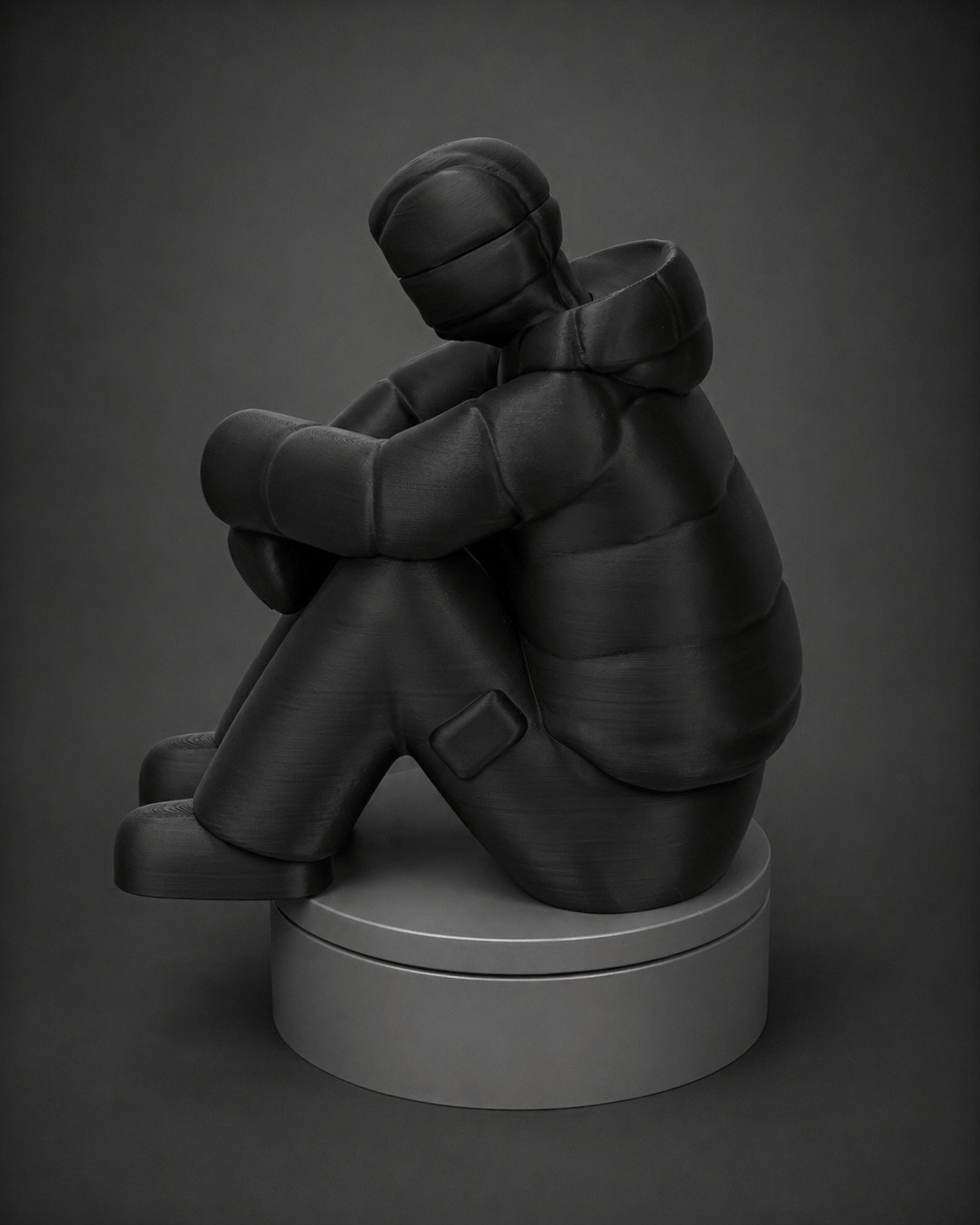 sad-man figurine + illuminated face