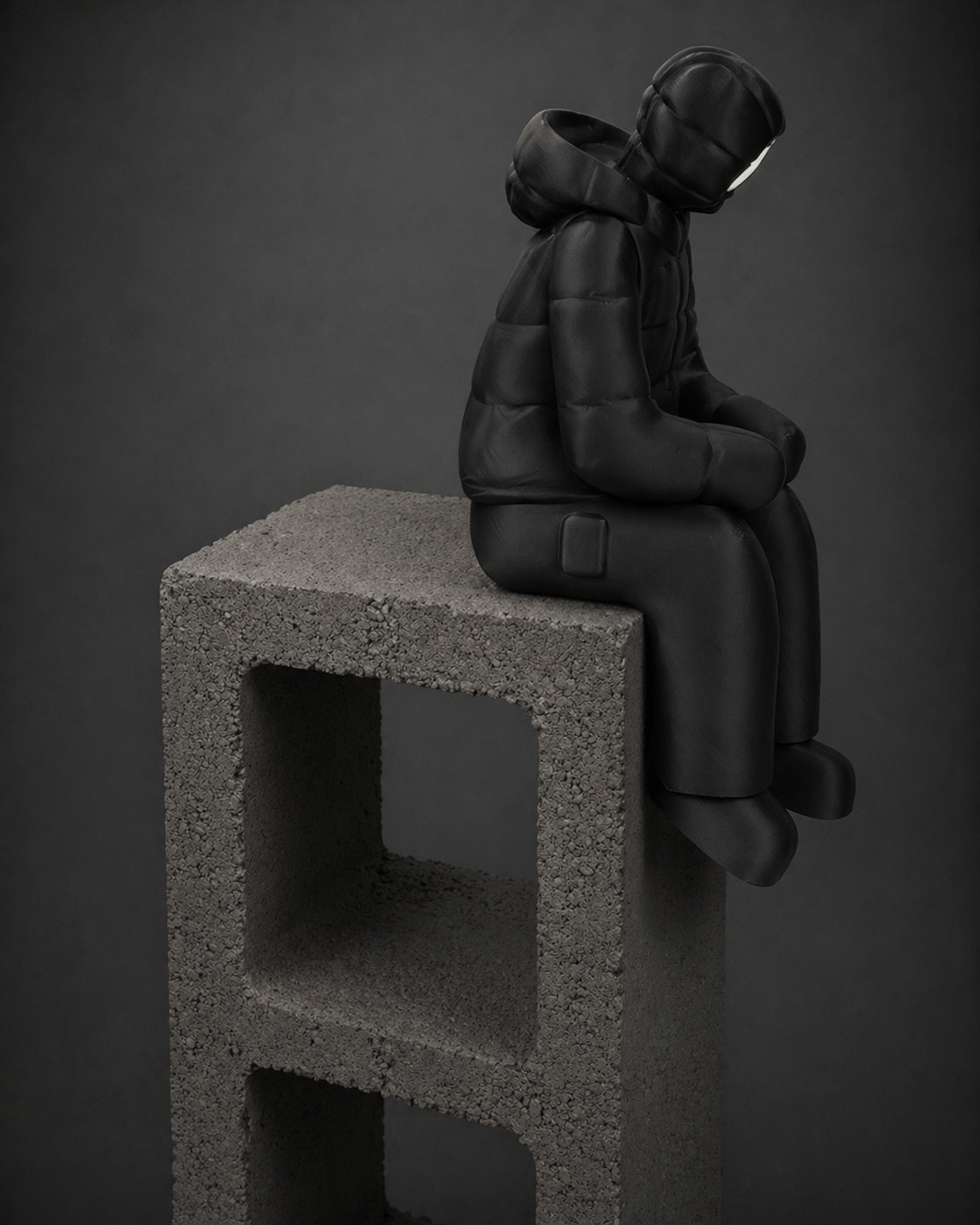 sitting-ledge figurine + illuminated face