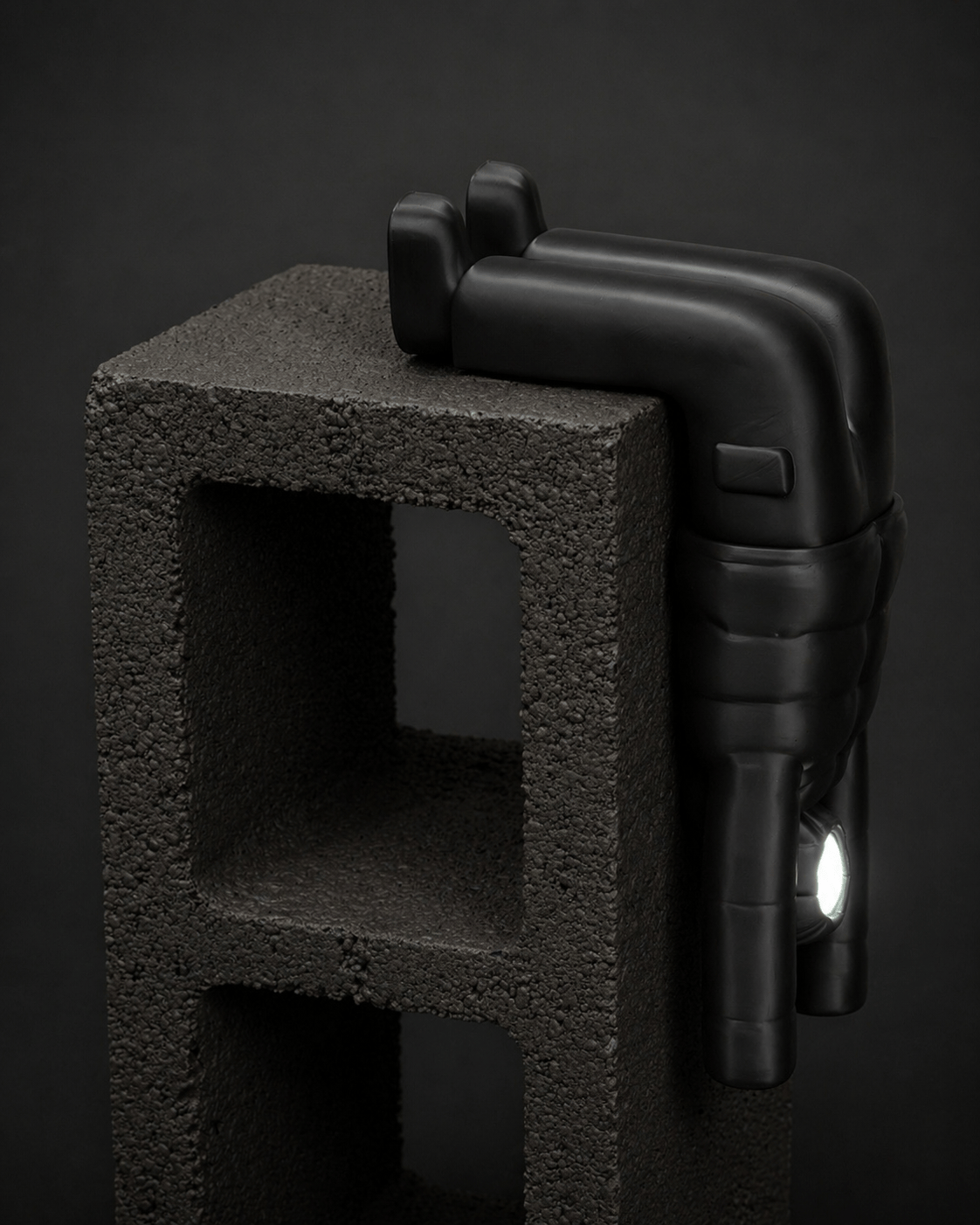 dangling-ledge figurine + illuminated face